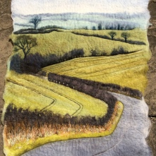This image is of a wet Felted Wallhanging. The subject matter is the Lincolnshire Wolds
